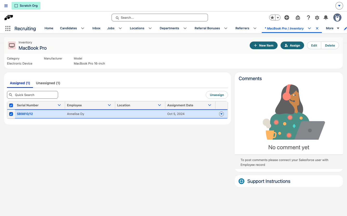 The Assigned tab of an Inventory record with one item selected and the Unassign button enabled