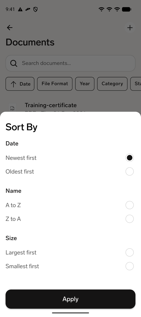 The Sort By sheet on the mobile Documents list with Newest first, Oldest first, A to Z, Z to A, Largest first, and Smallest first, above the File Format, Year, Category, and Status filters