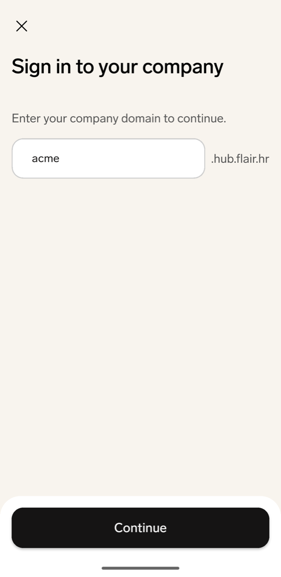The Sign in to your company screen in the flair mobile app with a company domain entered and the Continue button